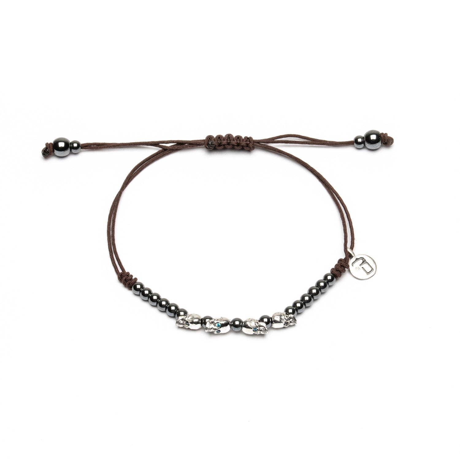 Pulsera Plata Macramé Cuatro Calaveras Pequeñas