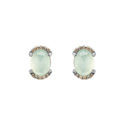 Silver stud earrings with chalcedony border and champagne-colored circus design.