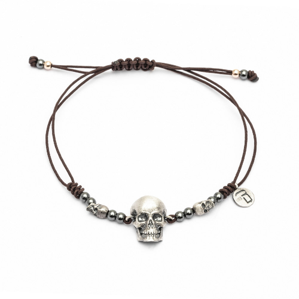 Pulsera plata macramé calavera